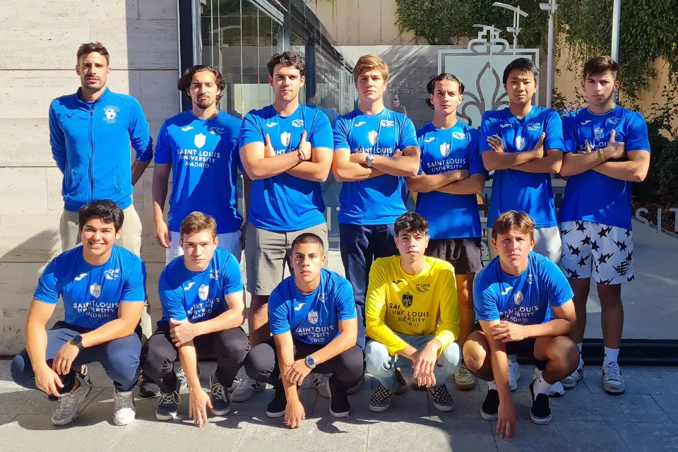 A soccer team posing for a group photo