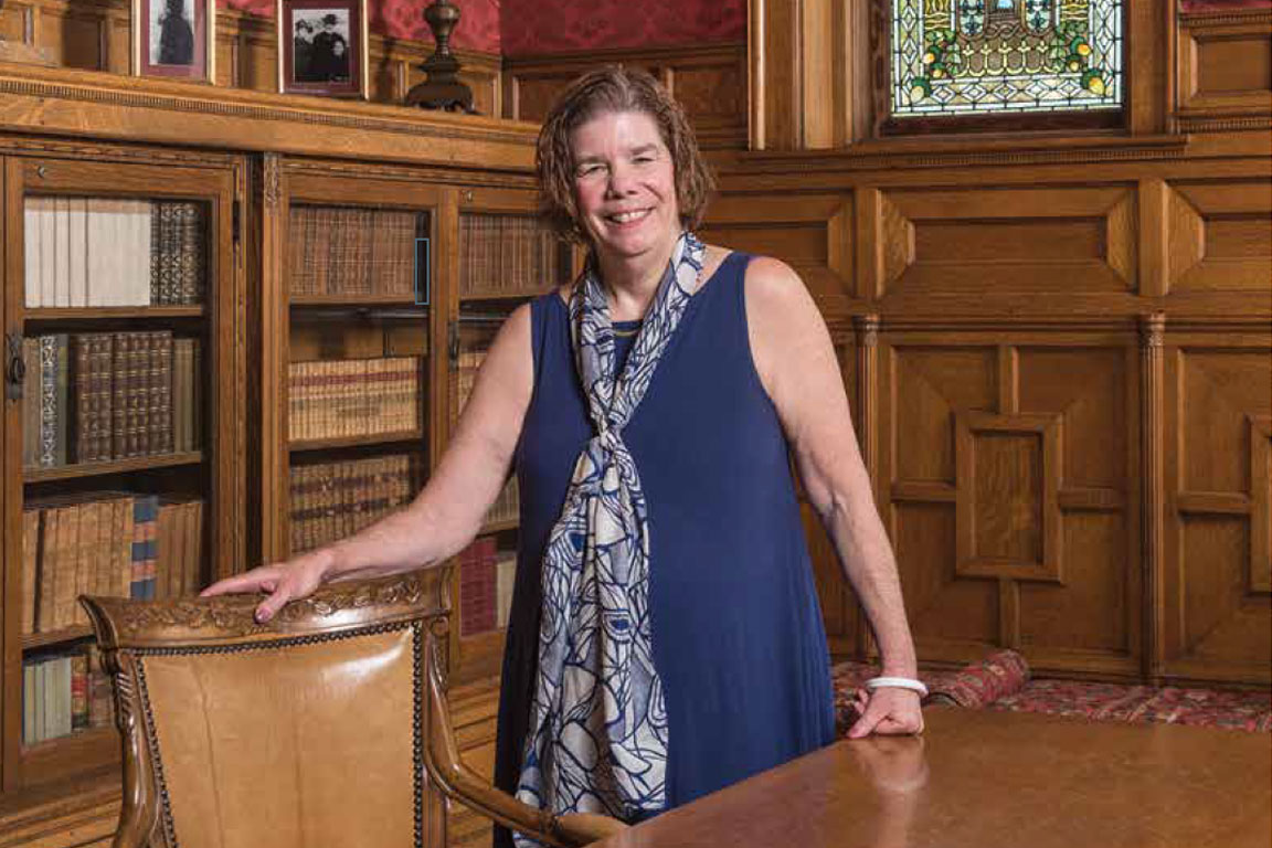 Dr. Frances Pestello in the library at Cupples House